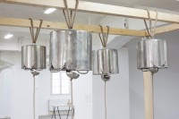 https://salonuldeproiecte.ro/files/gimgs/th-31_16_ Monotremu - Q_E_F_, 2014 installation (wood structure, metal pots, ladles, rope), variable dimensions.jpg